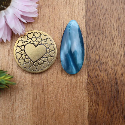 Bowlerite Cabochon - approx. 25 x 11 x 4.6 mm