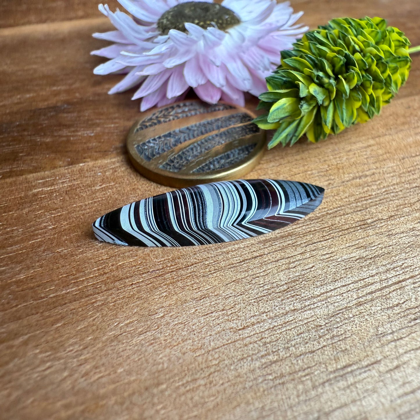 Fordite Cabochon - approx. 27 x 7 x 3.8 mm