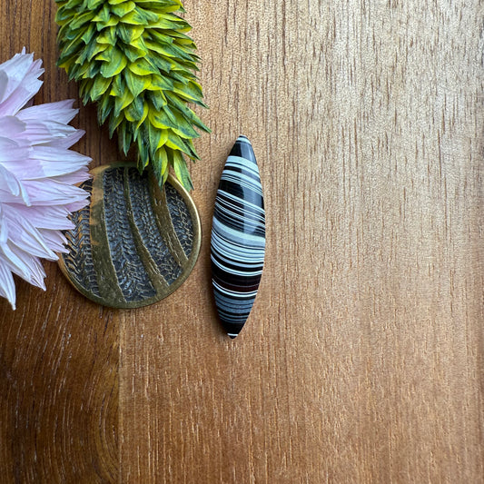 Fordite Cabochon - approx. 27 x 7 x 3.7 mm