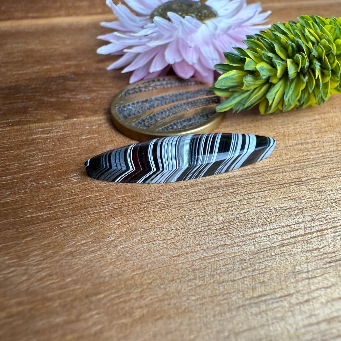 Fordite Cabochon - approx. 27 x 7 x 3.7 mm
