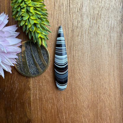 Fordite Cabochon - approx. 34 x 7 x 3.7 mm