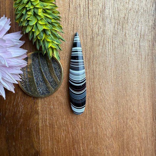 Fordite Cabochon - approx. 34 x 7 x 3.7 mm