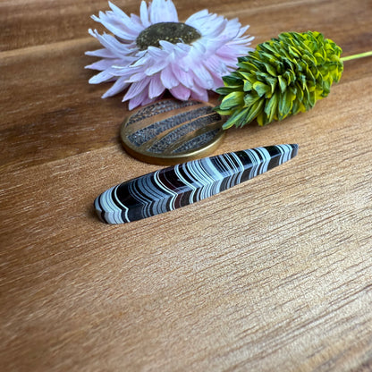 Fordite Cabochon - approx. 34 x 7 x 3.7 mm