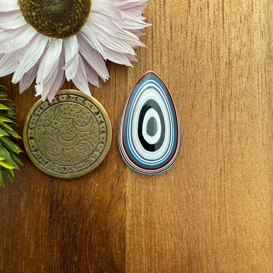 Fordite Cabochon - approx. 23 x 14 x 3.7 mm