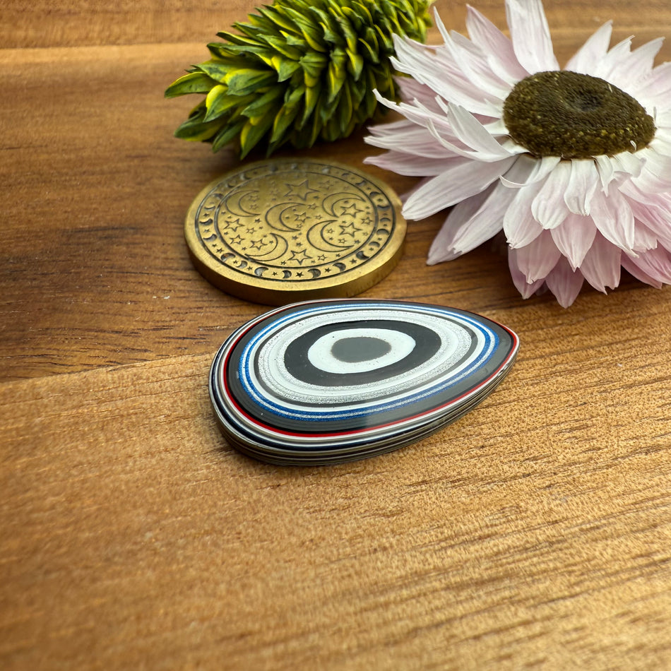 Fordite Cabochon - approx. 23 x 14 x 3.7 mm