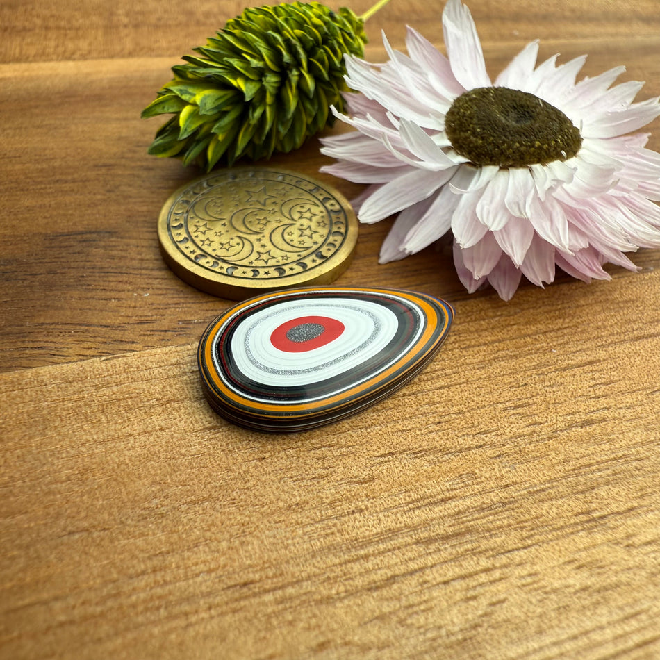 Fordite Cabochon - approx. 23 x 14 x 3.8 mm